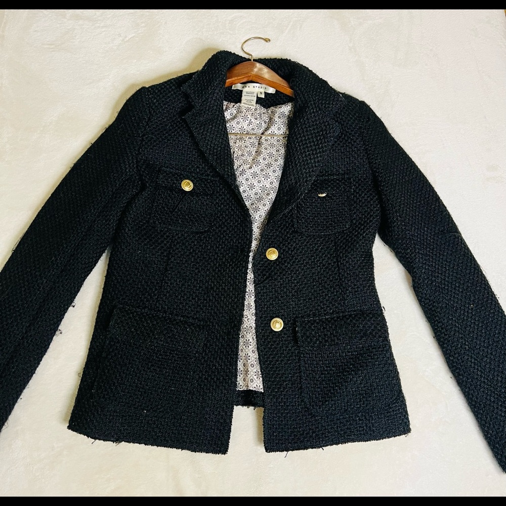 A black wool vintage coat, size made for smaller people